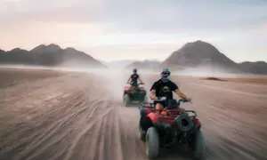 Desert Safari with Premium Lounge Access or Quad Biking at Iconic tourism LLC