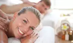 60 or 90 Min Couples Swedish or Hot Stone Massage Up to 50% Off