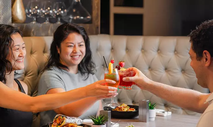 Indulge in a Cozy Dinner for Two or Four with Cocktails