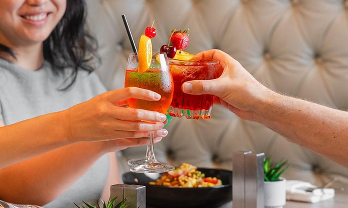 Indulge in a Cozy Dinner for Two or Four with Cocktails