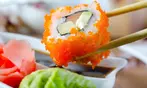 All You Can Eat BBQ & Sushi Extravaganza: Savory Meats, Rolls & More!