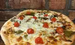 Get $20 worth of gourmet pizza and more for only $17!