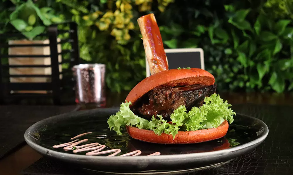 1 oder 2x Burger nach Wahl oder Traditional Chicken Wings inkl. Fries