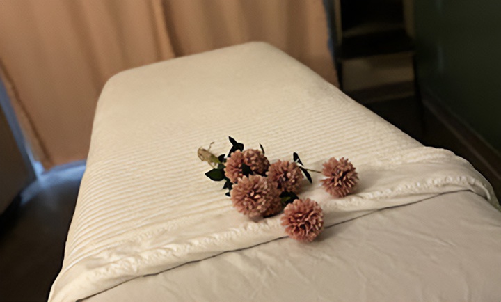 Rejuvenate with Swedish or Deep Tissue Massage with Hot Stones