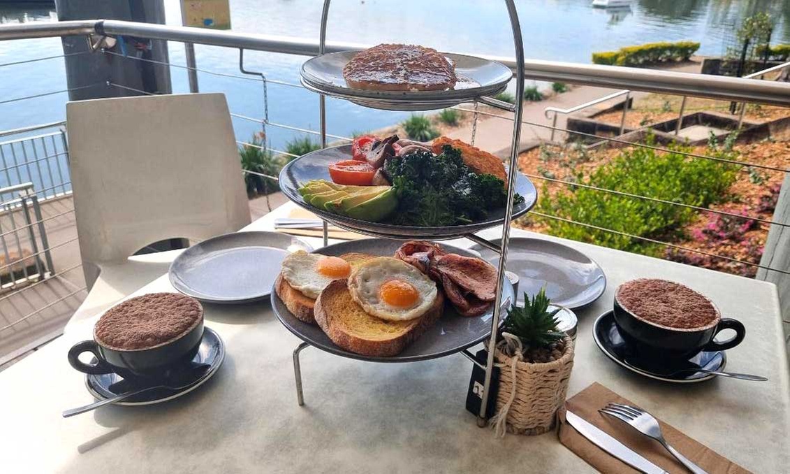 Enjoy a Delicious Breakfast Platter with Coffee by the Water