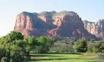Swing, Save, and Savor the View with 9 or 18 Holes of Golf with a Cart