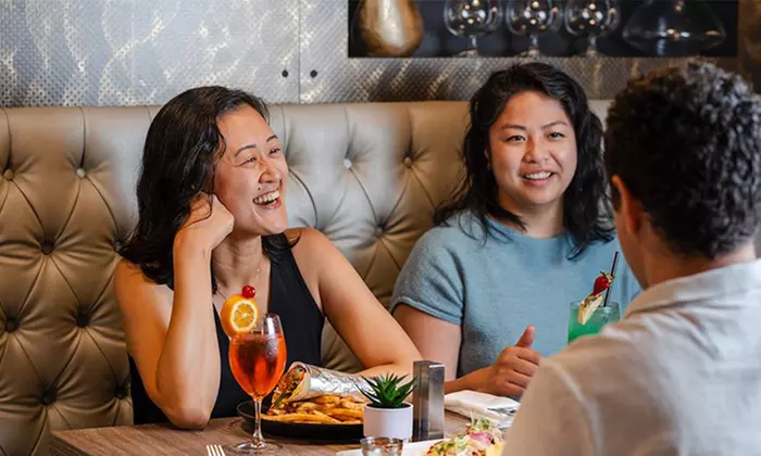 Indulge in a Cozy Dinner for Two or Four with Cocktails