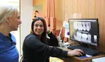 Thorough Dental Care: Exam, Cleaning & X-rays for One or Two