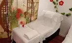 Massage or Reflexology with Hot Stones & Foot Bath: Up to 60 Minutes!