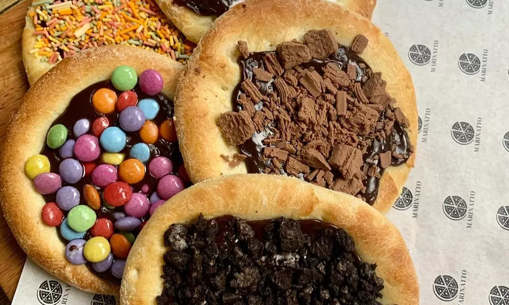 All-You-Can-Eat: Unlimited Starters, Pizza, Churros & Drink – 35% Off