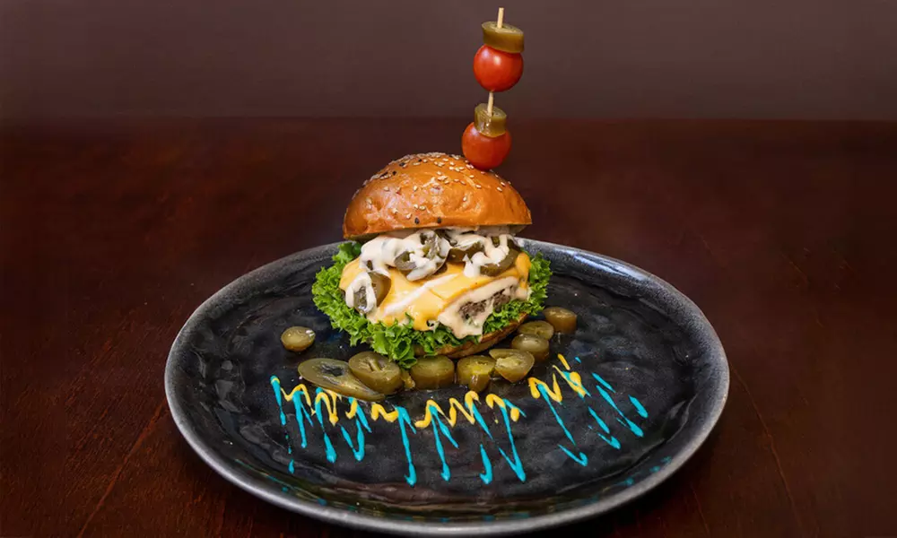 1 oder 2x Burger nach Wahl oder Traditional Chicken Wings inkl. Fries