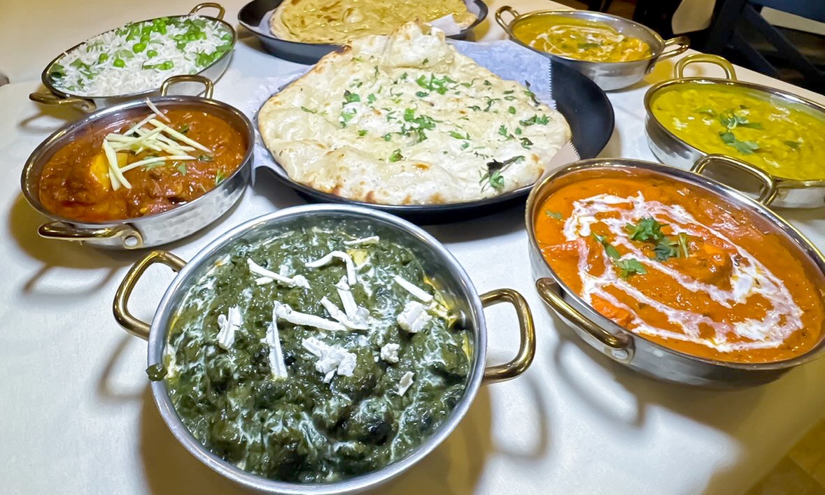 Authentic Indian Cuisine with Food Credit or Dinner for Two or Four