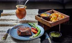 $50 for Food & Drink or Steak Dinner for 2 at Artango Bar & Steakhouse