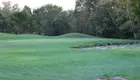 Elevate Your Game: 18 Holes of Golf with Cart for One or Two People