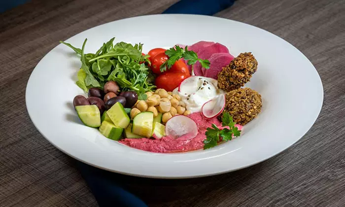 Indulge in a Cozy Dinner for Two or Four with Cocktails