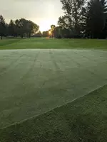 Elevate Your Game: 18 Holes of Golf with Cart for One or Two People