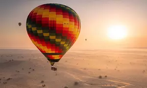 Hot Air Balloon Flight w/ Pickup & Drop-off for a Child or Adults @ Royal Falcon Balloons (Up to 35% Off)