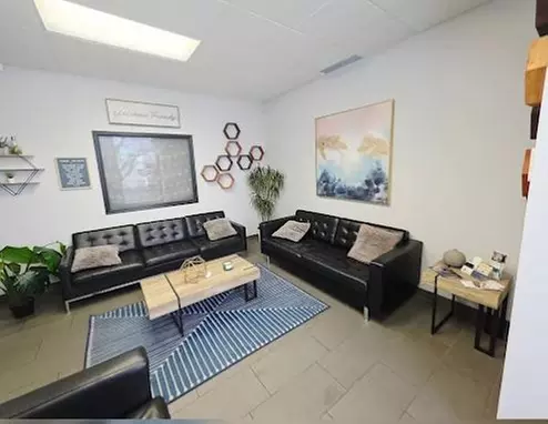 One 60 or 90 Min Therapeutic w/ Hot Stone or Deep Tissue/Sport Massage