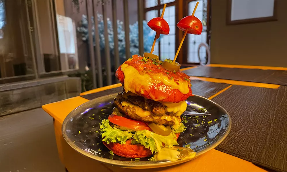 1 oder 2x Burger nach Wahl oder Traditional Chicken Wings inkl. Fries