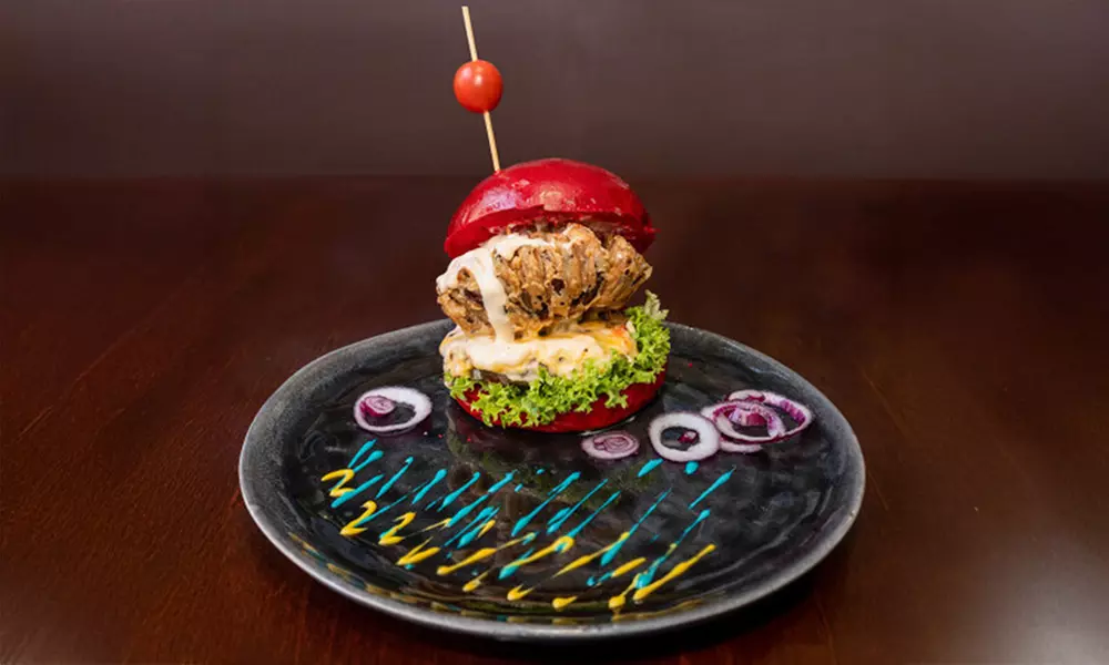 1 oder 2x Burger nach Wahl oder Traditional Chicken Wings inkl. Fries