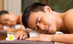 60 or 75-Min Hot Stone, Cupping Therapy, Body, Foot Massage & More