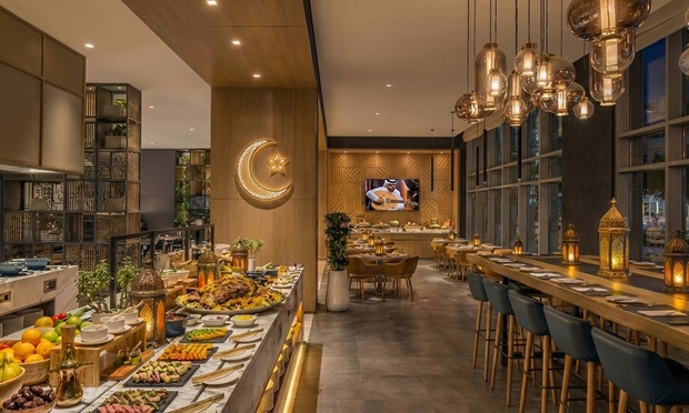 A vibrant Eid Lunch Buffet spread featuring an International BBQ and diverse dishes.