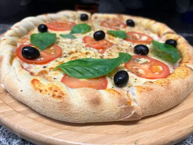 All-You-Can-Eat: Unlimited Starters, Pizza, Churros & Drink – 35% Off