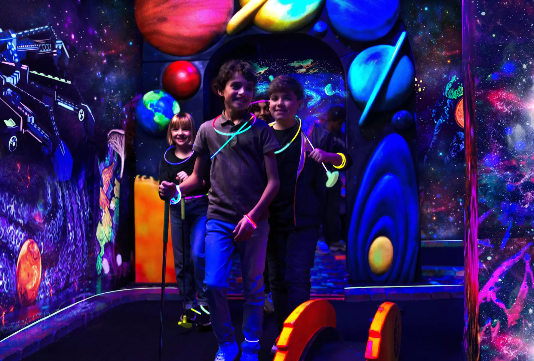 Blacklight Space-Themed Mini Golf Adventure