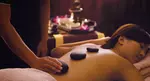 60 or 90 Min Couples Swedish or Hot Stone Massage Up to 50% Off