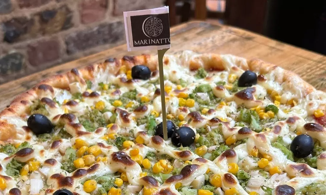 All-You-Can-Eat: Unlimited Starters, Pizza, Churros & Drink – 35% Off