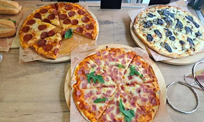 Menú de pizza o hamburguesa con patatas y bebida para 2 o 4 personas