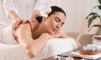 Experience a deluxe body massage with hot stones and essential oils