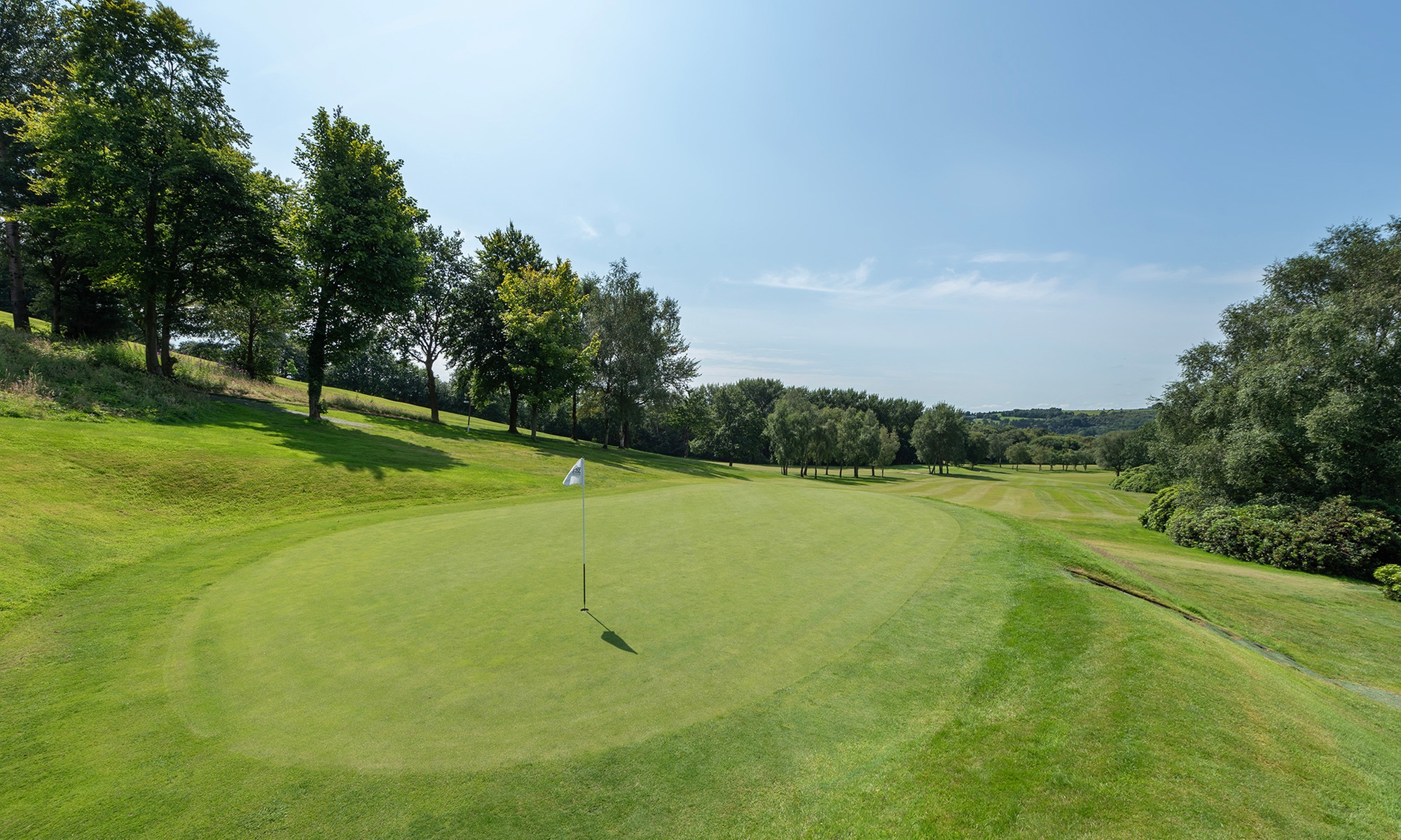 Tee Off on a 18-Hole Golf Course: Well-kept Greens & Panoramic Views!