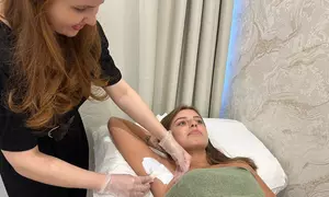 Get Silky Smooth: Women’s Hollywood + Underarms or Legs • Men’s Neck, Back & Chest Wax Packages (Up to 67% Off)