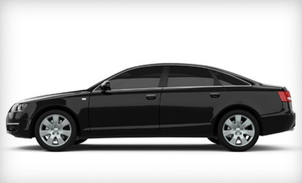 $49 for a Wash and Wax for a Car with Interior Vacuuming and Dusting at Mike's Tint Shop