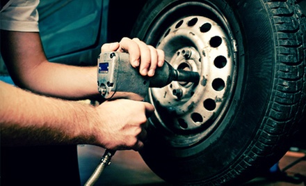 $55 for Oil Change, Tire Rotation, Brake Inspection, & Alignment at Grecco Quality Used Cars & Auto Service Center