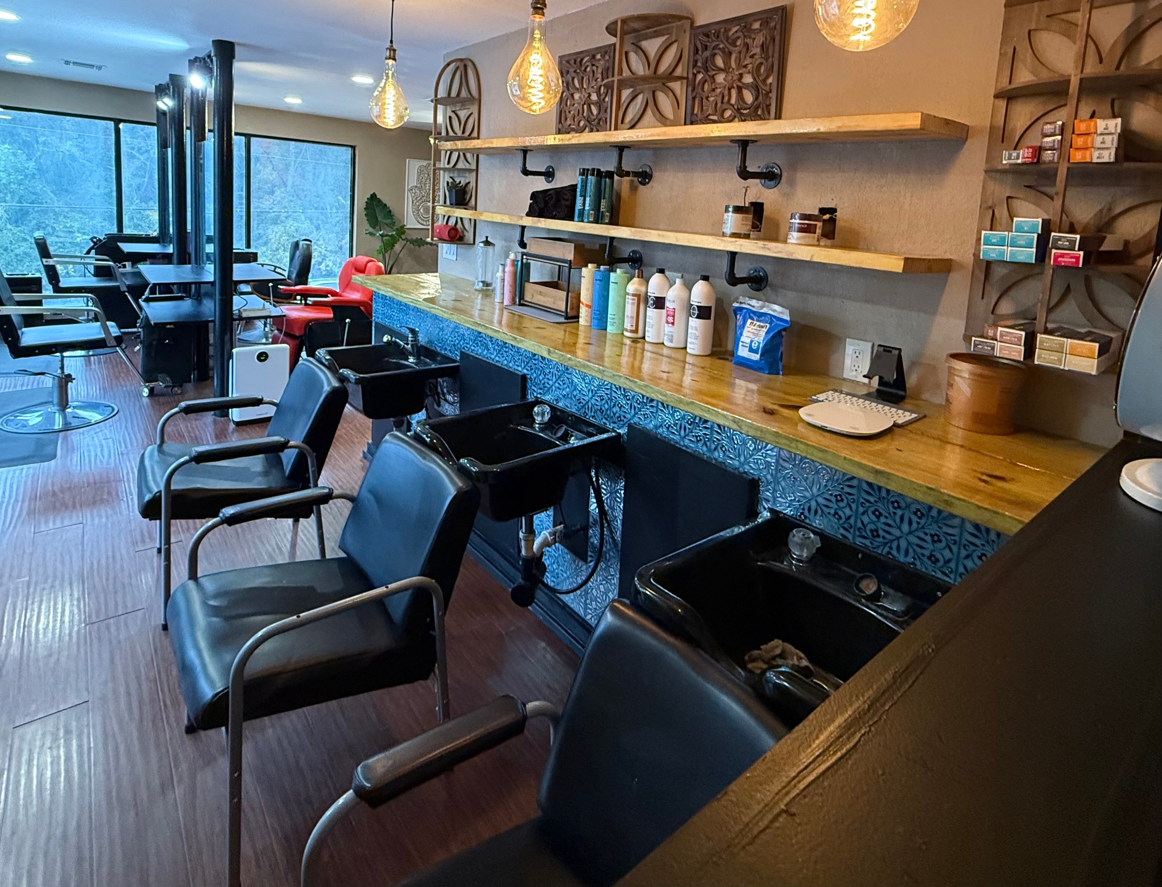 One Women's Haircut, Shampoo, Conditioning, Style, Blow Dry and More