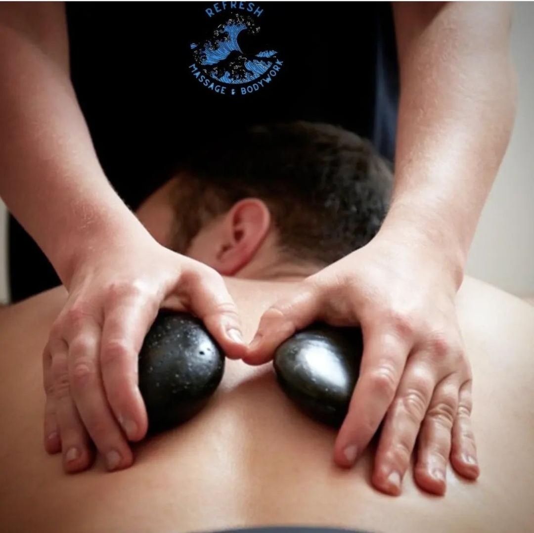 Rejuvenate with 60-Min Hot Stone, Lymphatic, or Cupping Massage