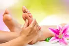 Massage or Reflexology with Hot Stones & Foot Bath: Up to 60 Minutes!