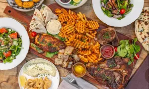 2-Course Meal with Sides & Drinks for 2, 4, or 6 for up to 49% Off at The Fourth Monkey Cocktail Bar and Grill