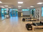 Pilates Reformer Classes: Sculpt & Strengthen