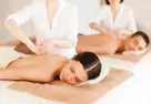Massage or Reflexology with Hot Stones & Foot Bath: Up to 60 Minutes!