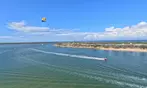 Soar to New Heights with Tandem Parasailing Adventure!