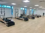 Pilates Reformer Classes: Sculpt & Strengthen