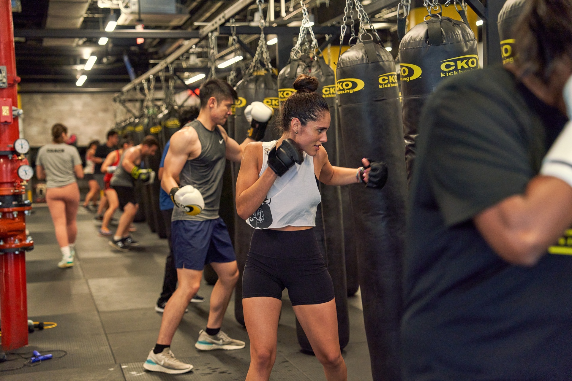 Experience unlimited CKO Kickboxing - Jersey City classes with premium gloves included, up to 49% off, for a full-body workout