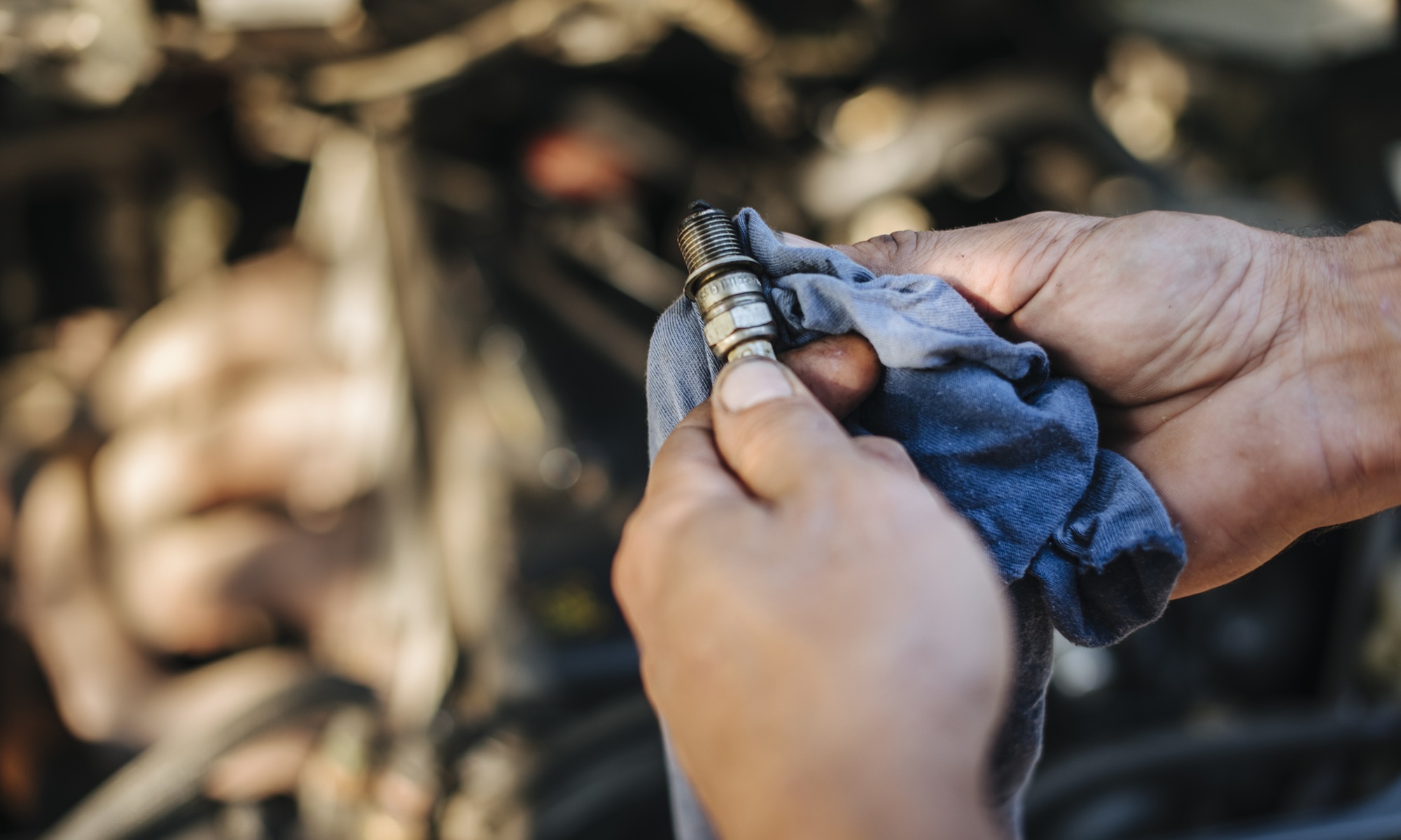 Tune Up and upto 8 Cylinder Spark Plug Replacement w Oil Change
