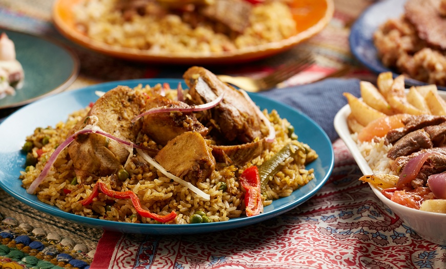 Image 1: Nigerian Meal with Soft Drink