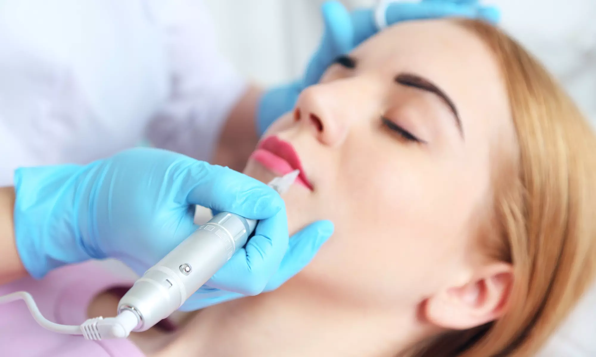 Enhance your beauty with Red Scissor Hair Salon's permanent lip lining sessions and save up to 33% - Primary Image