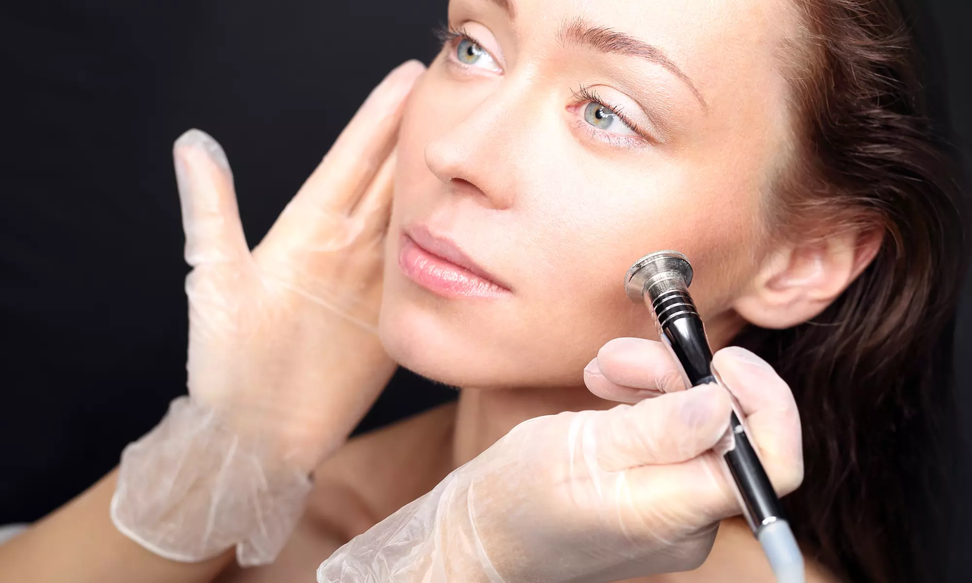 Experience EverYoung Spa's Facial Microdermabrasion Options with LED Therapy, offering up to 40% off rejuvenating skincare sessions - Primary Image
