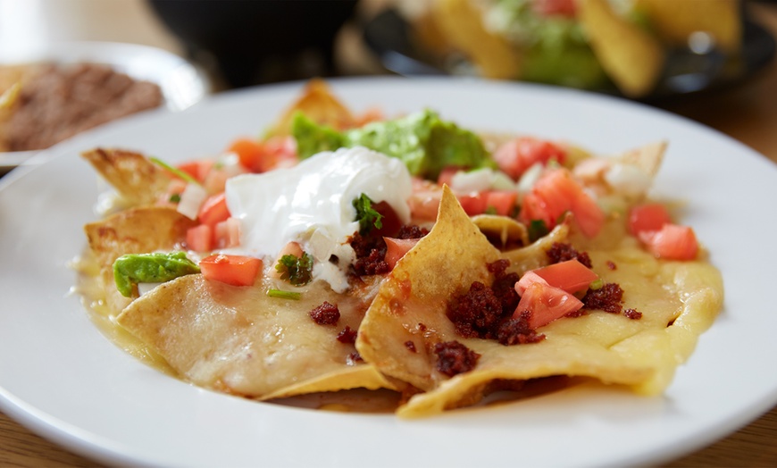 Image 2: Cocktails and Nachos Up to Four Persons at Twiddy's Grub House